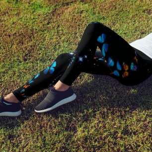 Borboletas azuis caem em estrelas Leggings pretas