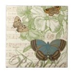 Borboletas em Música Folha com Design Floral<br><div class="desc">Um design floral verde e uma partitura musical servem de fundo para um trio de borboletas nesta peça do Vision Studio. A palavra francesa para a borboleta, o papillon, também está gravada no fundo da peça. Se você tem um forte amor por borboletas, natureza, ou como se rodeasse de beleza,...</div>