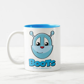 Botas e caneca do filhote de cachorro