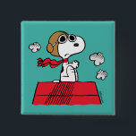 Bóton Quadrado 5.08cm Amendoins | Ace Voadora<br><div class="desc">Este design de amendoins bonitinho mostra Snoopy como a leitura de ás voadoras da Primeira Guerra Mundial para enfrentar o Barão Vermelho da Alemanha.</div>