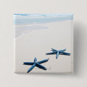 Bóton Quadrado 5.08cm Estrela do mar de dois azuis na borda da água em