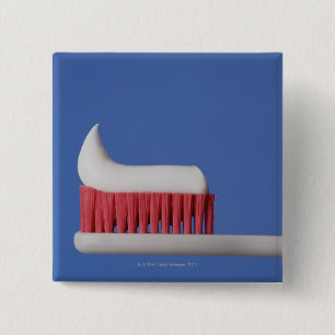 Bóton Quadrado 5.08cm Fim-acima do dentífrico em uma escova de dentes