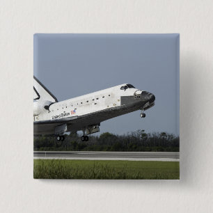 Bóton Quadrado 5.08cm Terras da descoberta do vaivém espacial na pista