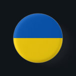 Bóton Redondo 2.54cm Drapeau Ukraine<br><div class="desc">Drapeau de l'Ukraine: Les couleurs sont associées au paysage ukrainien,  les bandes horizontales bleue et jaune symbolisent le ciel bleu sur les champs de blé.</div>