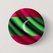 Maldives que acenam o botão do pinback da bandeira