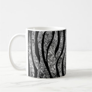 Brilho de prata e caneca de café preta das listra