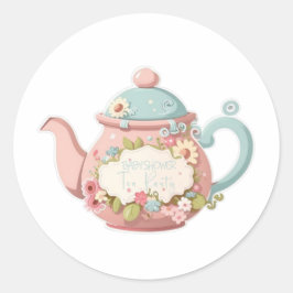 Bule de cor rosa e azul com adesivos florais