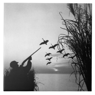 Caça do pato do homem