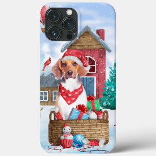 Cachorro Beagle na Casa de Natal na Neve
