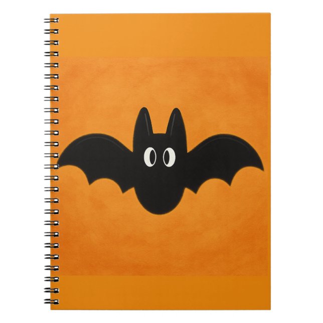 Caderno Espiral Bat Preto no Notebook de Foto em Fundo Laranja (Frente)