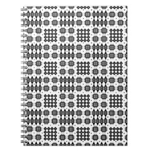 Caderno espiral branco do preto do teste padrão d