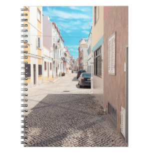 CADERNO ESPIRAL CARRO PRETO ESTACIONADO FORA