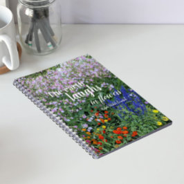Caderno Espiral Citação Floral A Terra Ri em Flores