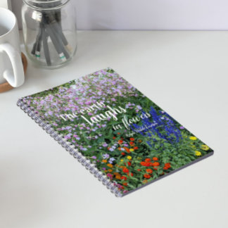 Caderno Espiral Citação Floral A Terra Ri em Flores
