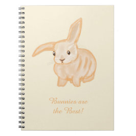 Caderno Espiral Coelhozinho Marrom Fofo - transparente sobre bege.