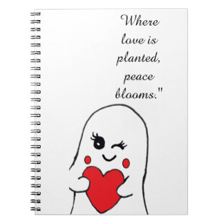 Caderno espiral com citação de amor pelo jardim.