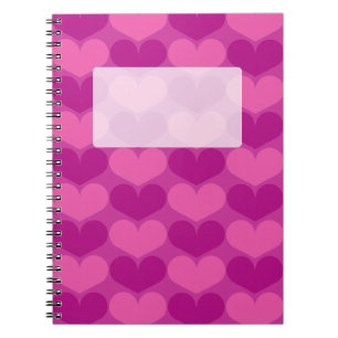 Caderno espiral com teste padrão cor-de-rosa