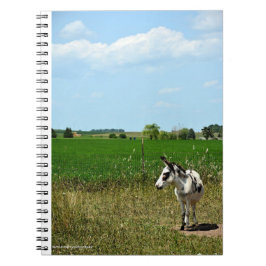 Caderno Espiral Donkey em um campo