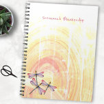Caderno Espiral Dragonflies Over Pastel Color Abstract Custom<br><div class="desc">This custom design features a rustic yellow and pink spiral pastel background with three dragonflies in the lower left corner. Fill in the template fields with your information, remove all text or click customize to select a font style, color, and size you prefer. A fun gift idea for any someone...</div>