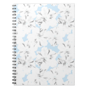 Caderno Espiral Flores brancas em azul claro.