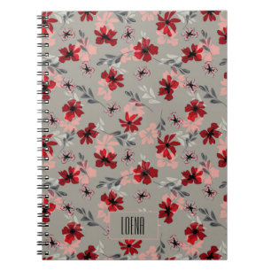 Caderno Espiral Flores rosa vermelho em um fundo cinza.