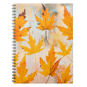 CADERNO ESPIRAL FOLHAS AMARELAS