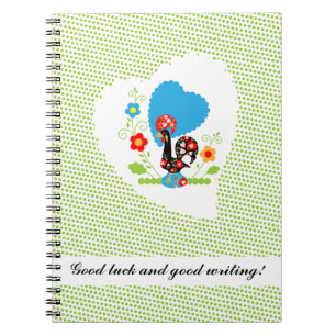 Caderno Espiral Galo Português com bolinhas verdes claras.