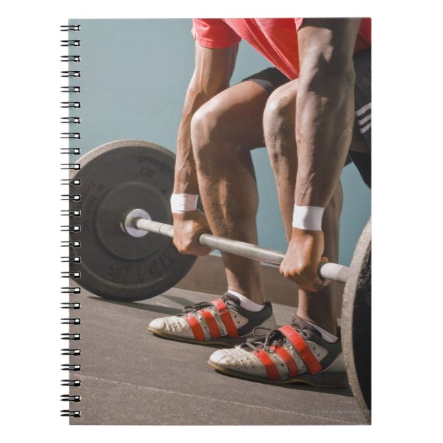 Caderno Espiral Homem afro-americano a trabalhar na academia (Frente)