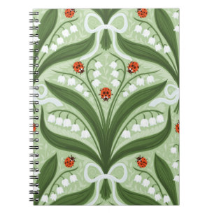 Caderno Espiral Lily do vale e a simetria de joias em verde.