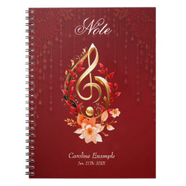 Caderno Espiral Limpa ouro com folhas vermelhas.
