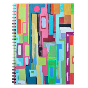 Caderno Espiral Lua sobre o notebook Miami