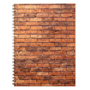 Caderno Espiral Maçã de estrutura vermelha de parede de tijolos