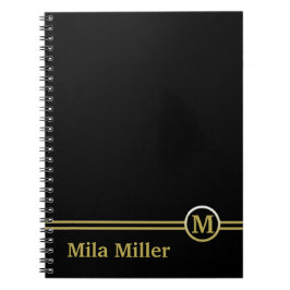 Caderno Espiral Monograma Dourado sobre fundo preto