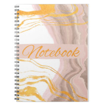 notebook branco, rosa e ouro