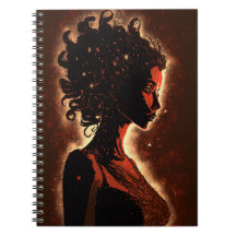 Notebook vermelho e castanho