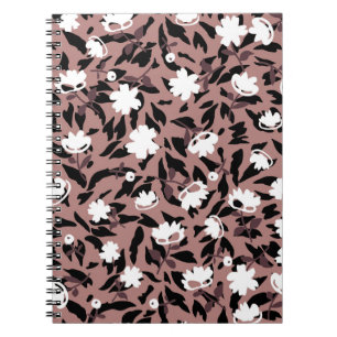 Caderno Espiral Padrão floral sobre fundo leopardo.