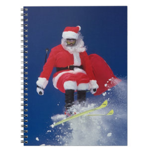 Caderno Espiral Papai Noel no salto de esquis fora de um cornice
