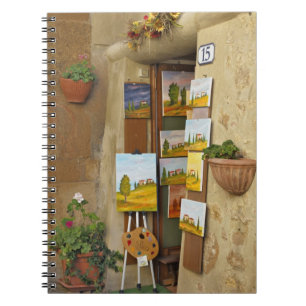 Caderno Espiral Pequena loja com obras de arte à venda na calçada