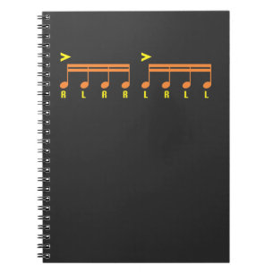 Caderno Espiral Rufar da partitura do baterista de Paradiddle
