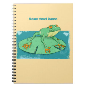 Caderno Espiral Sapo verde-claro numa almofada de lírios