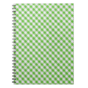 Caderno Espiral Tecido verde fechado, textura da mesa