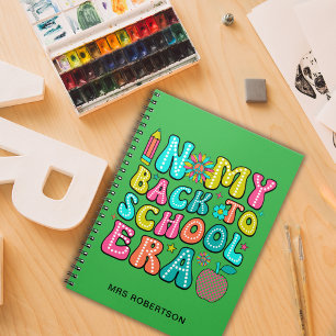 Caderno espiral verde de volta à escola para profe