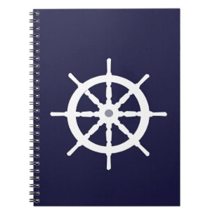 Caderno Espiral Volante no fundo dos azuis marinhos