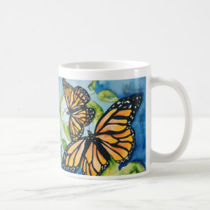 Café caneca das borboletas de monarca