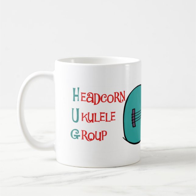 Café Caneca do grupo do Ukulele de Headcorn (CANECA do (Esquerda)