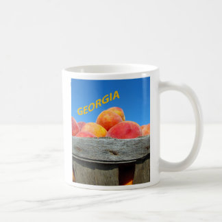 Café Caneca dos pêssegos de Geórgia