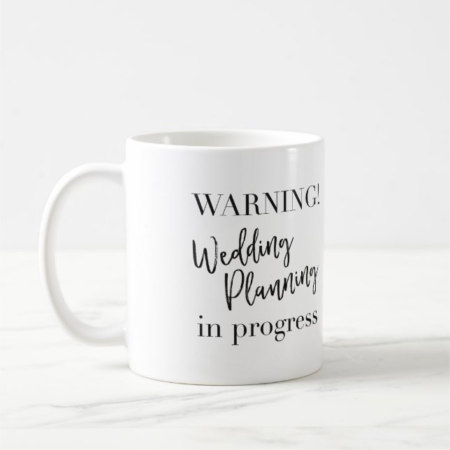 Café Casamento de advertência que planeia a caneca em (Esquerda)