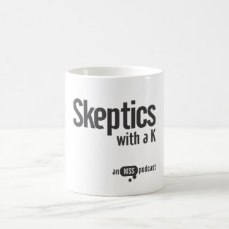 Café Cépticos com uma caneca de K