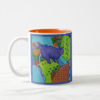 Café Em Dois Tons Gato numa caneca de cor quente