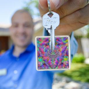 Caleidoscópio Cósmico: Chaveiro de Triquetra Vibra